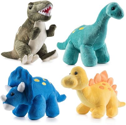 Grünes Tyrannosaurusplüschspielzeug mit den langen spitzen Zähnen ein Dinosaurierplüschspielzeug hergestellt von prägeartigem scherendem Plüsch
